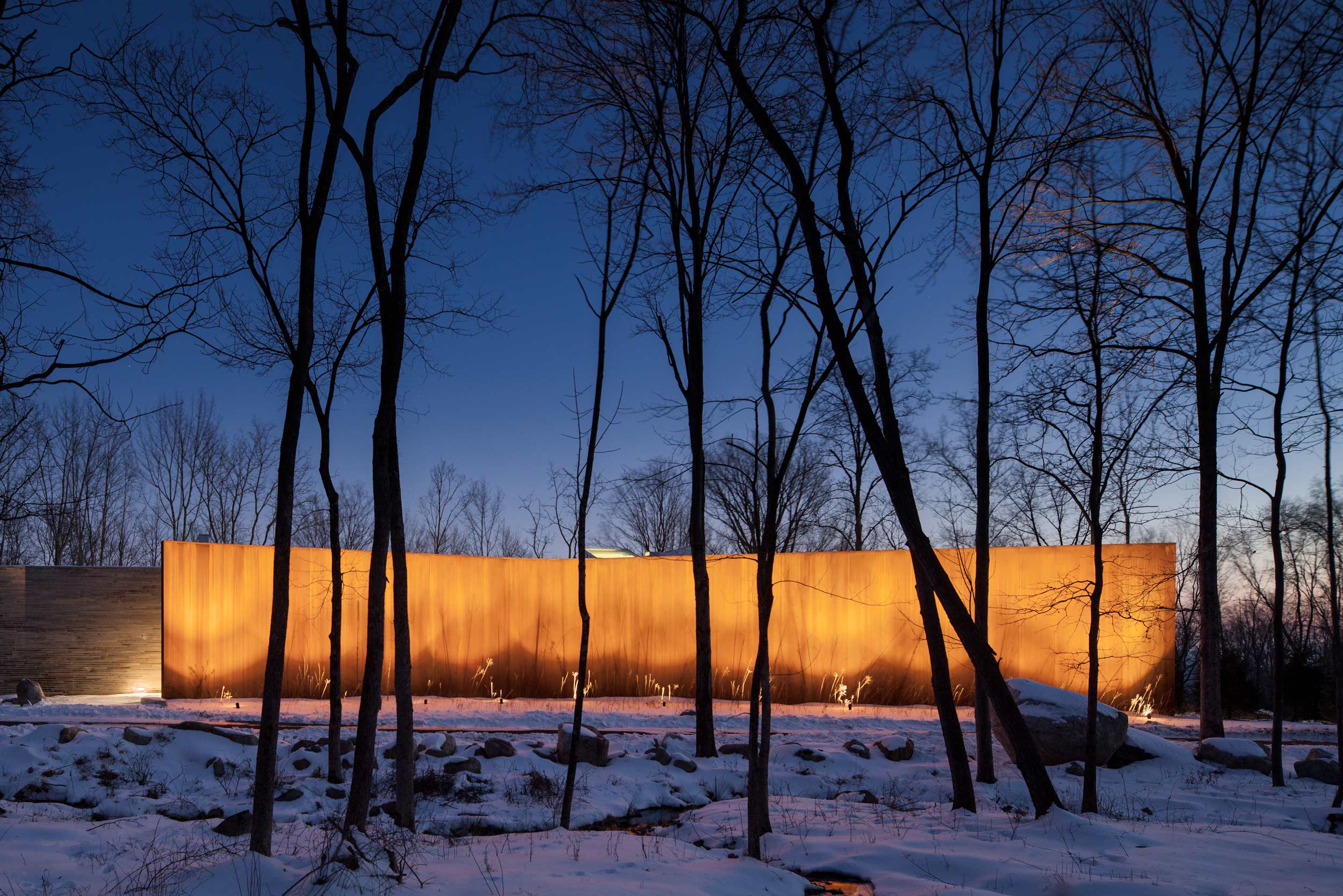 William Reue Architect House in the Woods with Corten Steel Wall in Snow