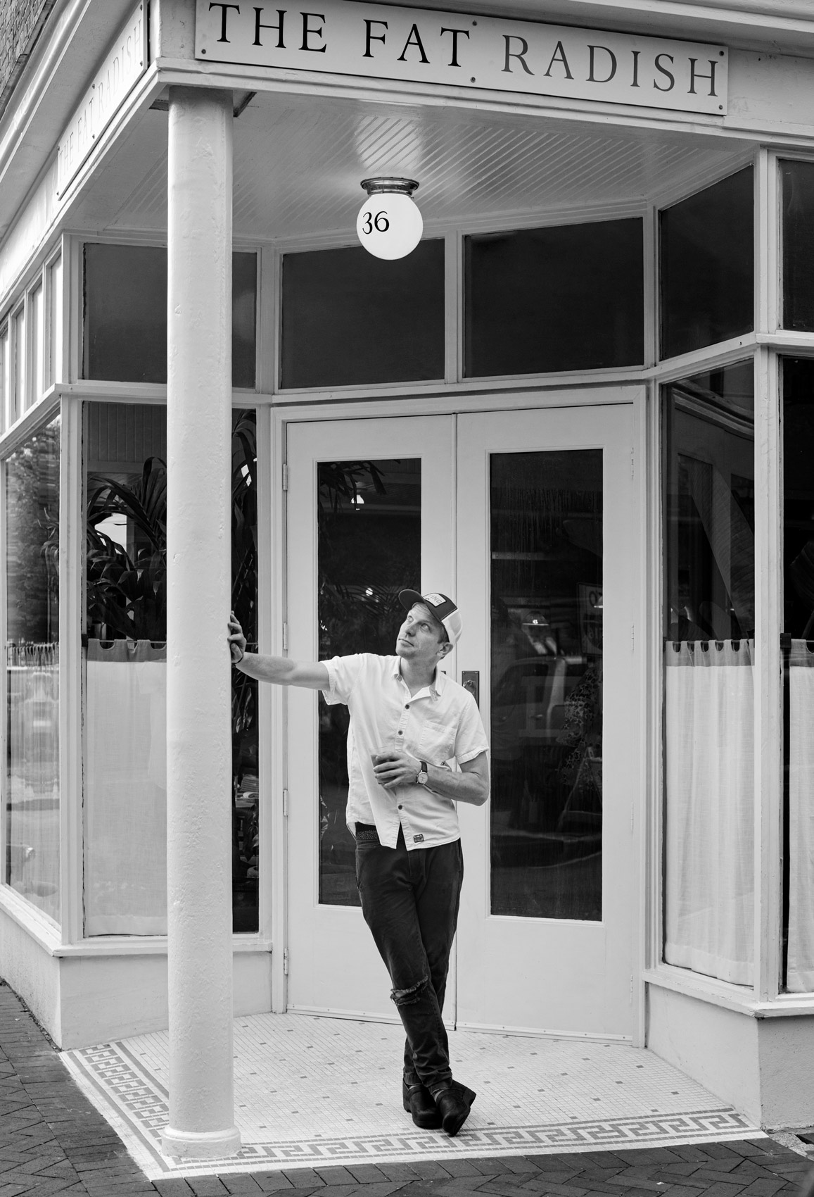 Chef Nick Wilbur Black and White Photography outside The Fat Radish in Savannah